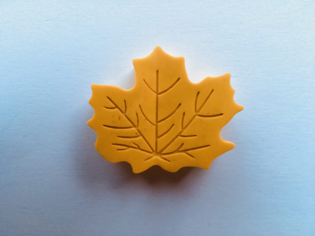 yellow leaf-shaped crayon