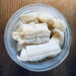 frozen banana pieces in a mason jar