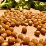 roasted chickpeas and broccoli on a sheet pan