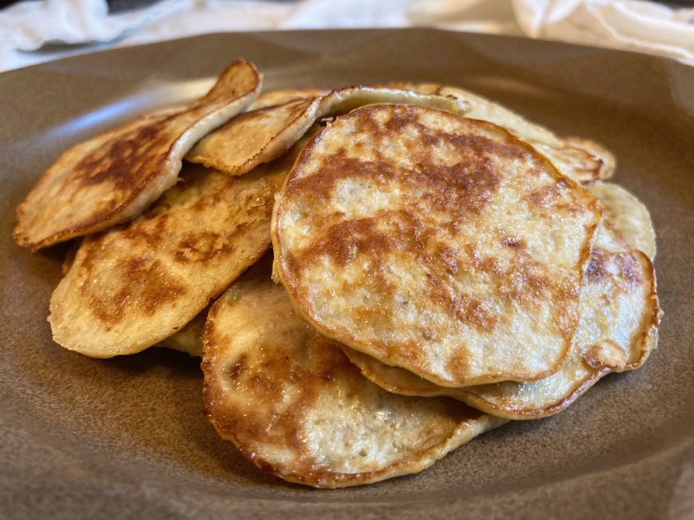 stack of flourless banana pancakes on a plate
